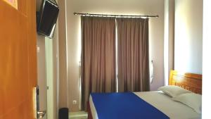 阿玛利亚马里奥波罗酒店客房内的一张或多张床位