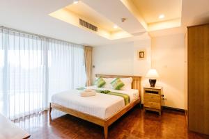 SeaRidge Hua Hin Resort & Poolvilla客房内的一张或多张床位