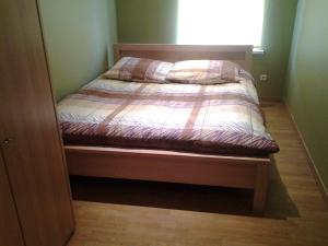 Jaani 2-1 Apartment客房内的一张或多张床位