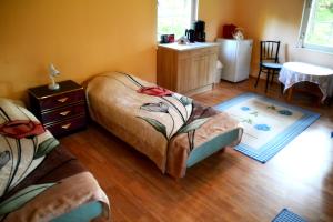 Roosi Camping Houses客房内的一张或多张床位