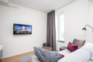 ApartDirect Älvsjö客房内的一张或多张床位