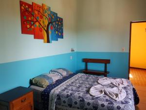 伊瓜苏大瀑布旅馆客房内的一张或多张床位