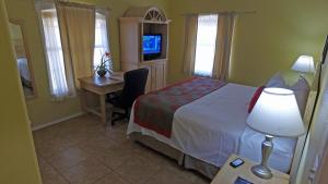 南帕德里岛华美汽车旅馆客房内的一张或多张床位