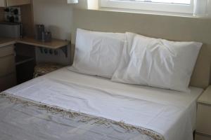 海平面阁楼公寓客房内的一张或多张床位