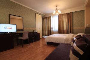 Guest Rooms Stay Nexus客房内的一张或多张床位