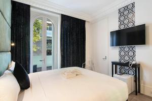 悉尼精品酒店客房内的一张或多张床位