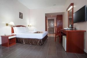 赛里马来西亚龙平酒店客房内的一张或多张床位