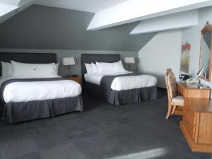 圣皮埃尔湖酒店客房内的一张或多张床位
