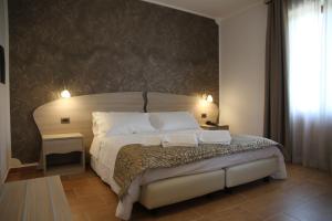 Monte San Giovanni-Nebrodi Rooms客房内的一张或多张床位