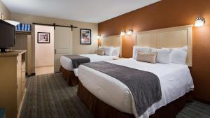 阿卡迪亚公园贝斯特韦斯特酒店客房内的一张或多张床位