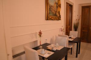 Palazzo Liguori餐厅或其他用餐的地方