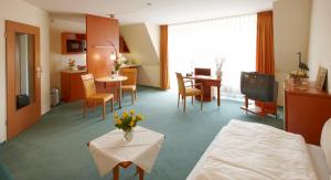 Grothenns Hotel 3-Sterne superior的休息区