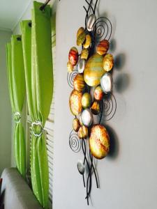 威廉斯塔德库拉索阿波罗尼亚精品度假屋的挂在墙上的一群蔬菜