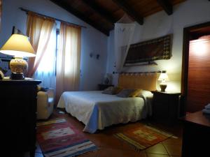 Villa Amalia - mansarda客房内的一张或多张床位