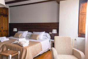 La Vereda ONLY ADULTS客房内的一张或多张床位