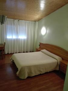 卡萨米克尔酒店-餐厅客房内的一张或多张床位