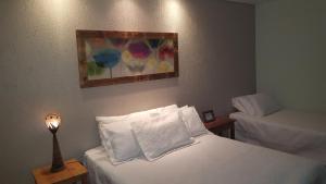 普萨达迪亚曼特旅馆客房内的一张或多张床位