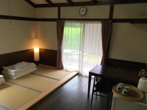 A private retreat Cotton Club Cottage客房内的一张或多张床位