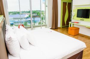 普拉贾克特拉设计酒店客房内的一张或多张床位