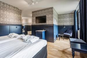 Hällsnäs Hotell & Restaurang客房内的一张或多张床位