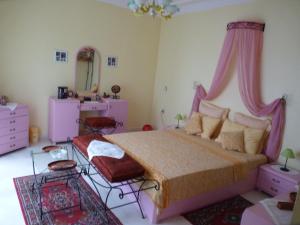 Chez Axia Marrakech客房内的一张或多张床位