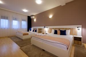 加尼机场酒店客房内的一张或多张床位