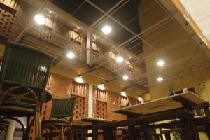 Mangaldas Ni Haveli II by The House of MG餐厅或其他用餐的地方