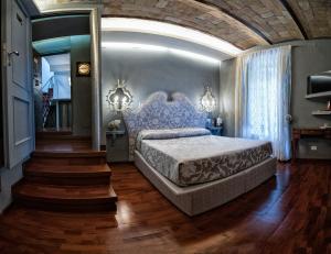 安缇卡洛坎达酒店客房内的一张或多张床位