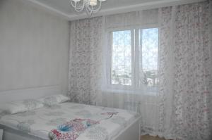 Apartment na Sportivnaya 17/1客房内的一张或多张床位