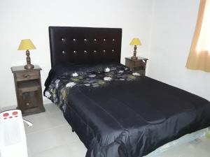 Cabañas Santa Teresita客房内的一张或多张床位
