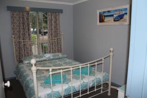 朱里恩湾海滩度假屋客房内的一张或多张床位