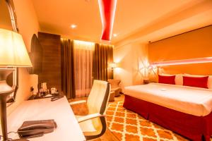 卡内连荣耀鲍尔酒店客房内的一张或多张床位