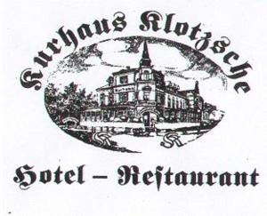 德累斯顿库哈斯可切酒店及餐厅的圆圈中房屋的画