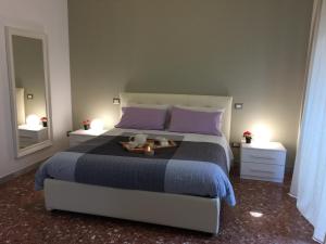 罗马甜蜜之家公寓客房内的一张或多张床位