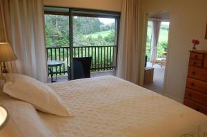 Te Awa Lodge客房内的一张或多张床位