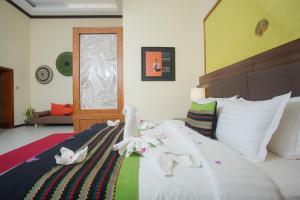我的蒲甘阿马塔度假酒店客房内的一张或多张床位