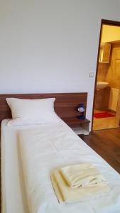 诺瓦住宿加早餐旅馆客房内的一张或多张床位