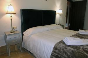 Casa Rural Andalucia Mia客房内的一张或多张床位