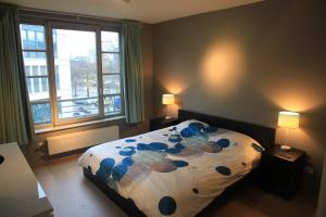 布鲁塞尔新设计公寓客房内的一张或多张床位