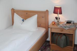 本瓦尔德西酒店客房内的一张或多张床位