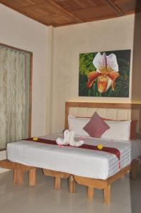 水晶海滩巴厘酒店客房内的一张或多张床位