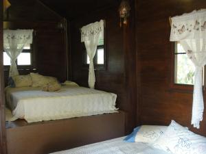 桑萨旺度假酒店客房内的一张或多张床位