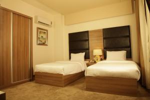 Quaint Hotel Erbil客房内的一张或多张床位