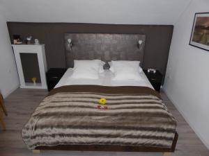 Hotel Garni-Tell客房内的一张或多张床位