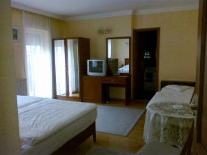 茨埃斯塔佩泽欧酒店客房内的一张或多张床位