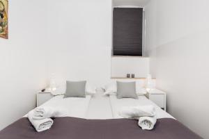 Apartment Fiorentina客房内的一张或多张床位