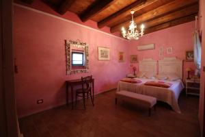 Poggio Montali客房内的一张或多张床位