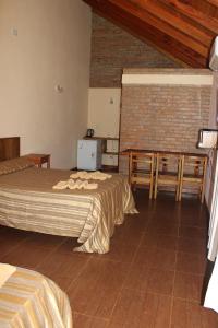 Un Lugar Hotel Cabañas客房内的一张或多张床位
