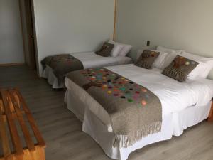 Mangata Hotel Low Cost客房内的一张或多张床位
