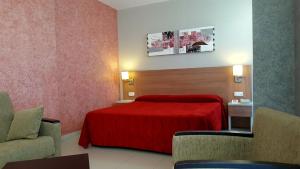 罗多马spa及海水疗养酒店客房内的一张或多张床位